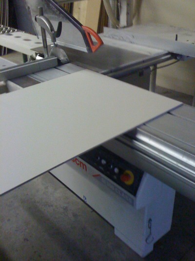 Fiber cement panel being cut using a table saw Fiber cement panel being cut using a table saw